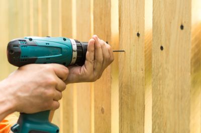 Improve Curb Appeal with Wood Fence Repair!